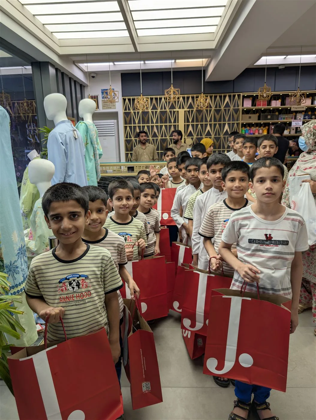 Children on a shopping outing with the Aasra team