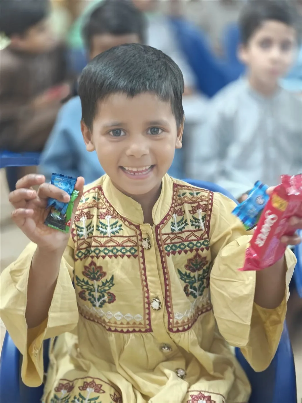 Children enjoying snacks at the Aasra Children's Home